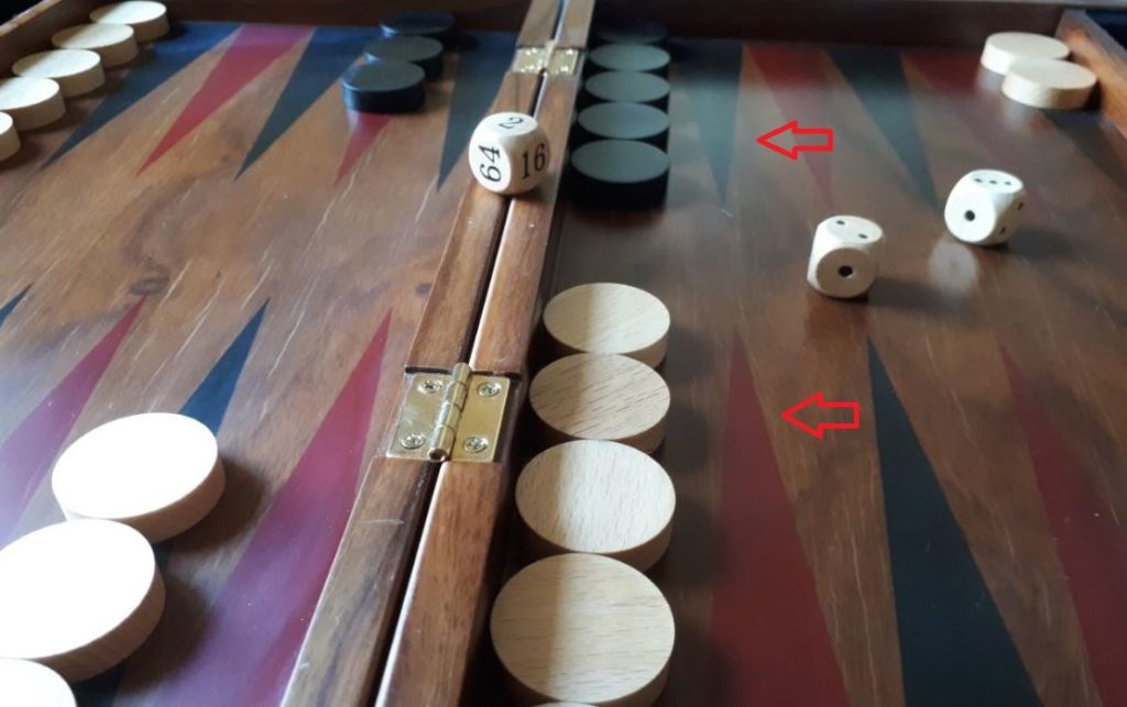 Backgammon sacrifice for good positions. Link to Libra backgammon set.